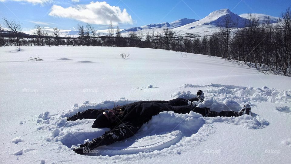 Making a snow angel!