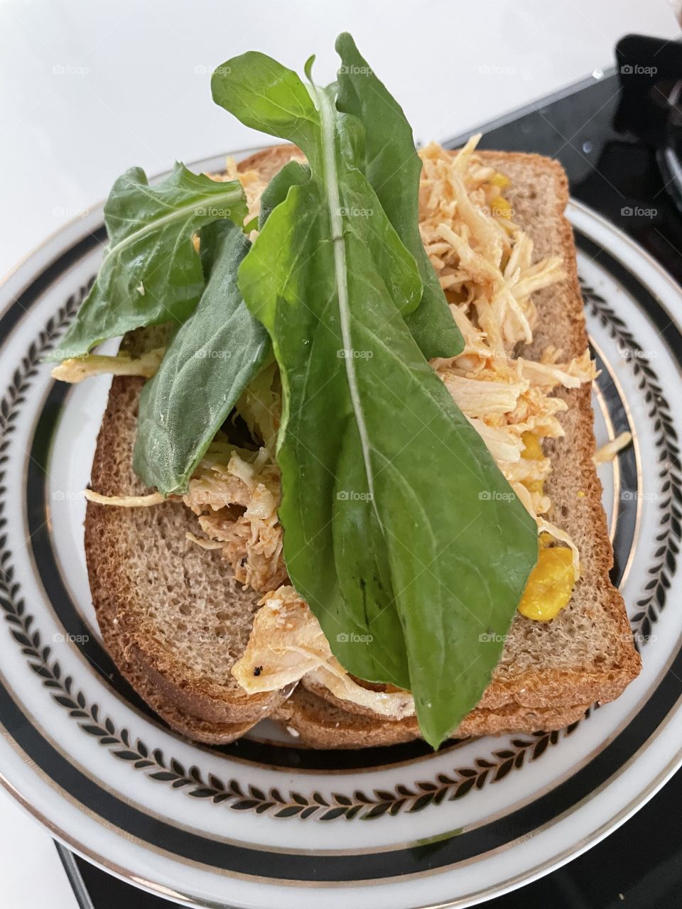 Natural sandwich with chicken and arugula
