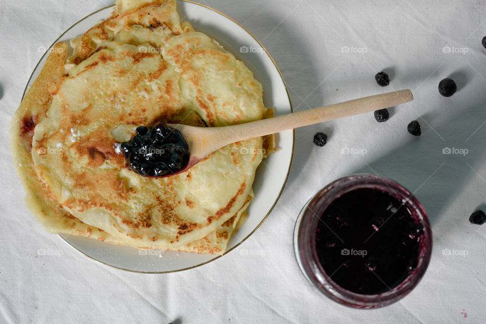Pancakes and blueberry jam for breakfast