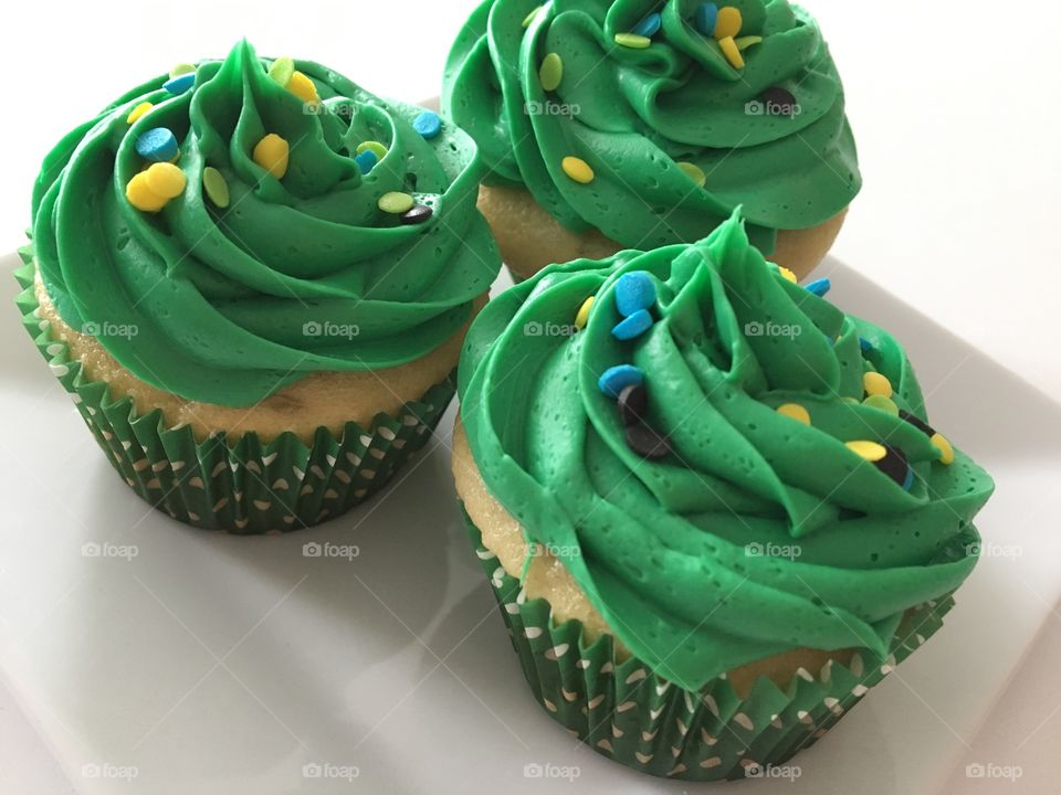 White Cupcakes with Green Buttercream Frosting 