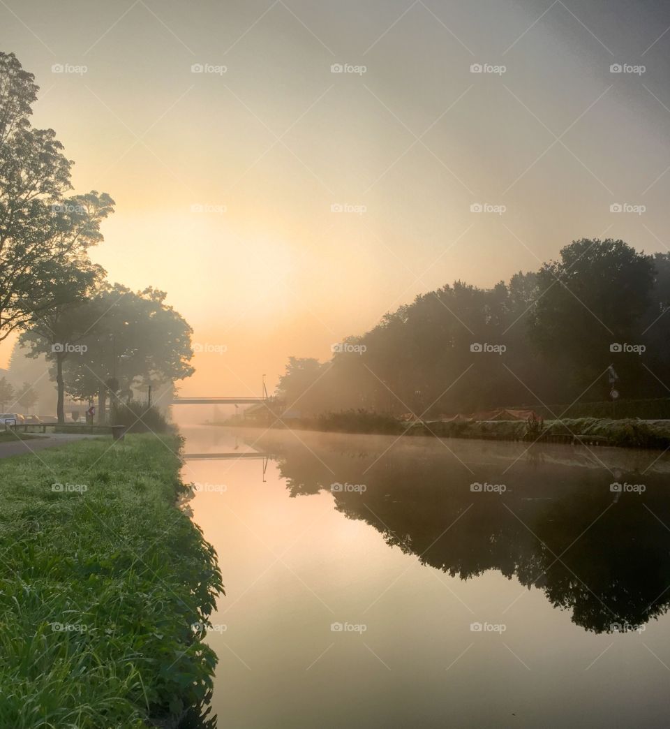 Golden mist over The water