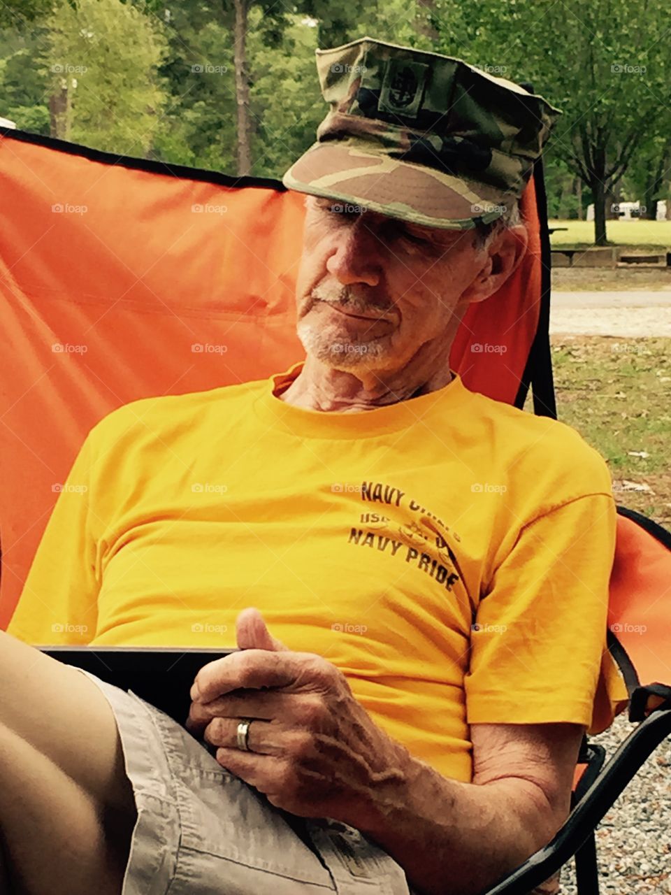 Senior man using digital tablet