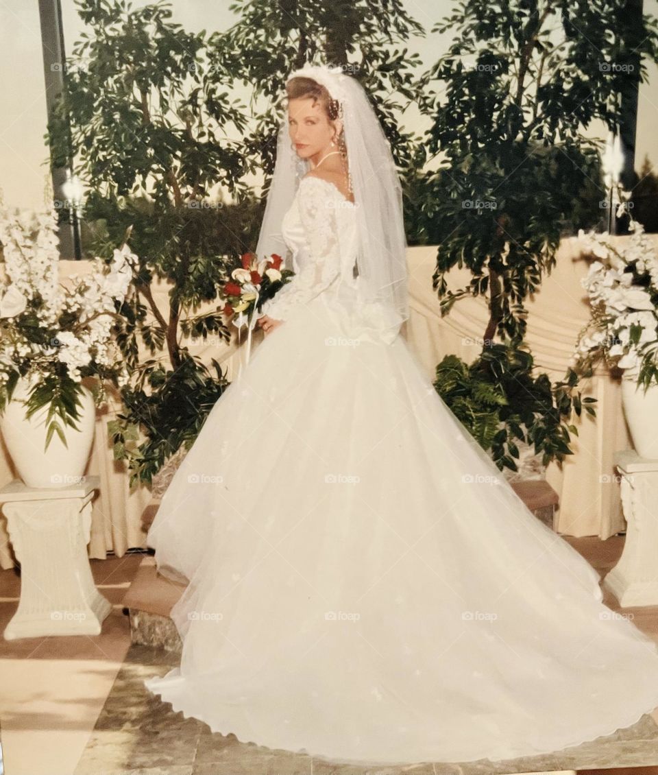 My wedding day, 1996! Still married 2022. Been together since we were 16 years old.