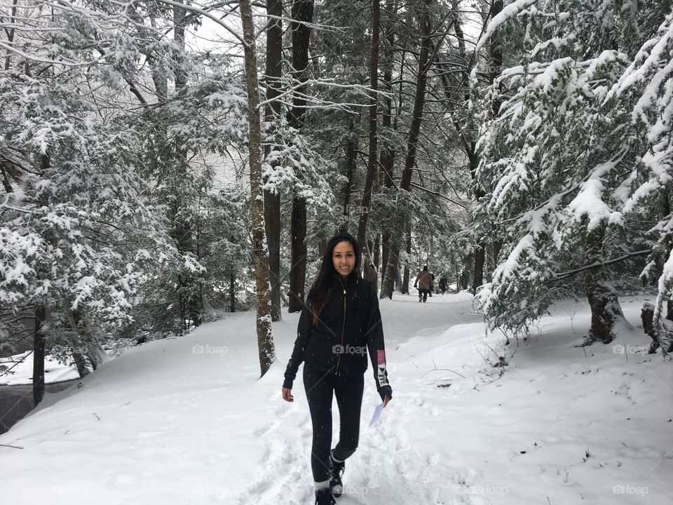 Girl walking in the snow