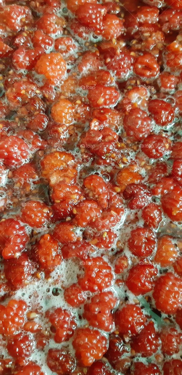 Making raspberry jam😊.