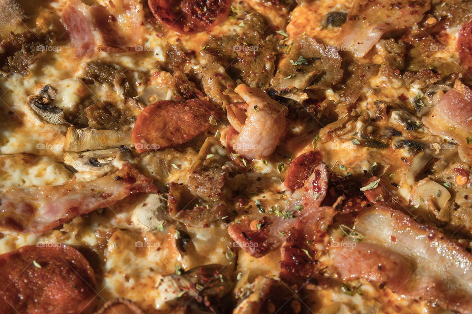 Pizza with salami and bacon