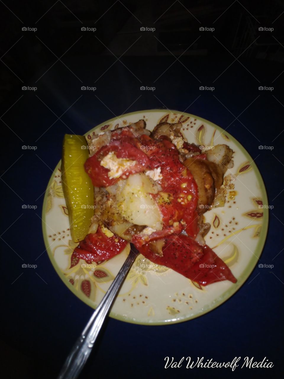 potaos eggs tomatoes on plate
