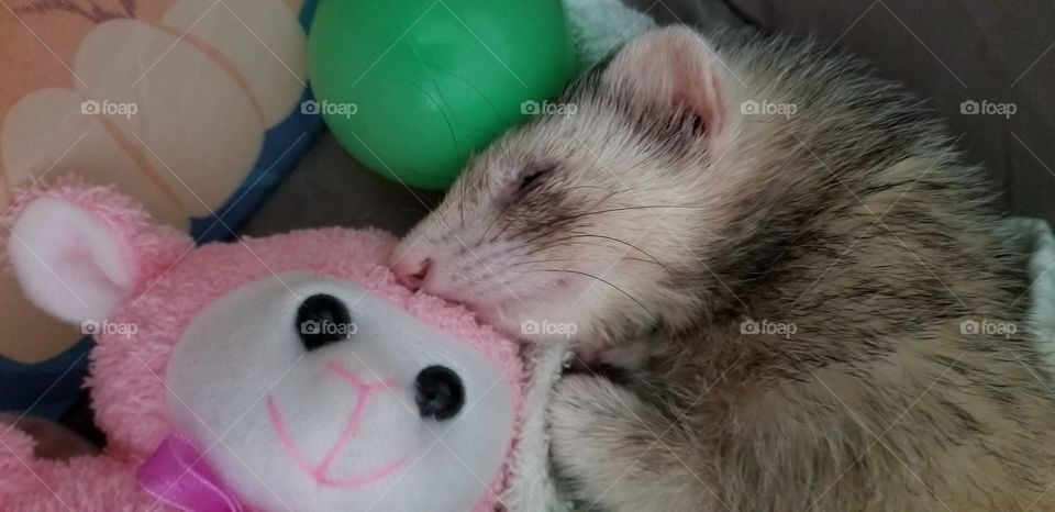 Sleeping with his baby.