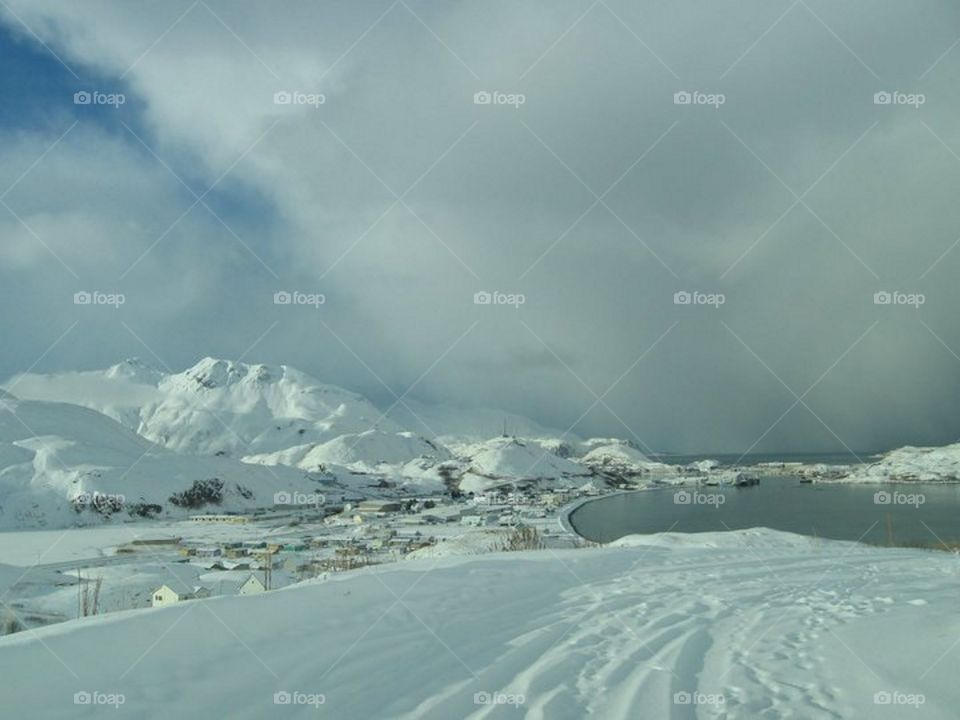 Scenic view of mountains covered with snow