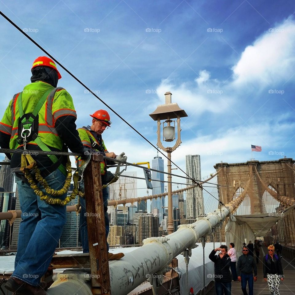 Construction workers at the Brooklyn bridge