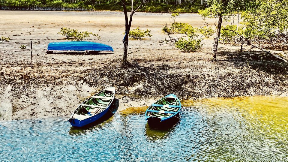 Two coloured boats in the river 