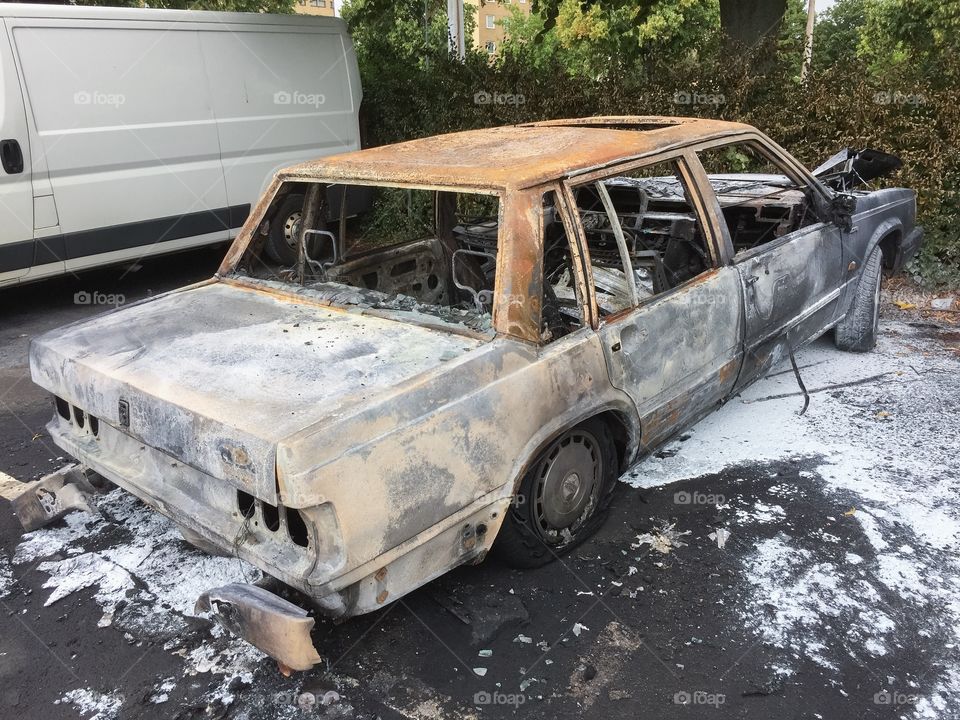 burned-out car in Sweden.