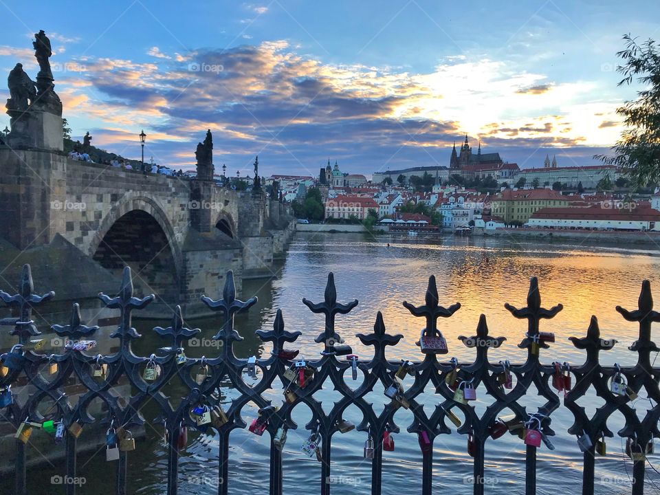 Sunset view at St Charles Bridge in Prague, Czech Republic 
