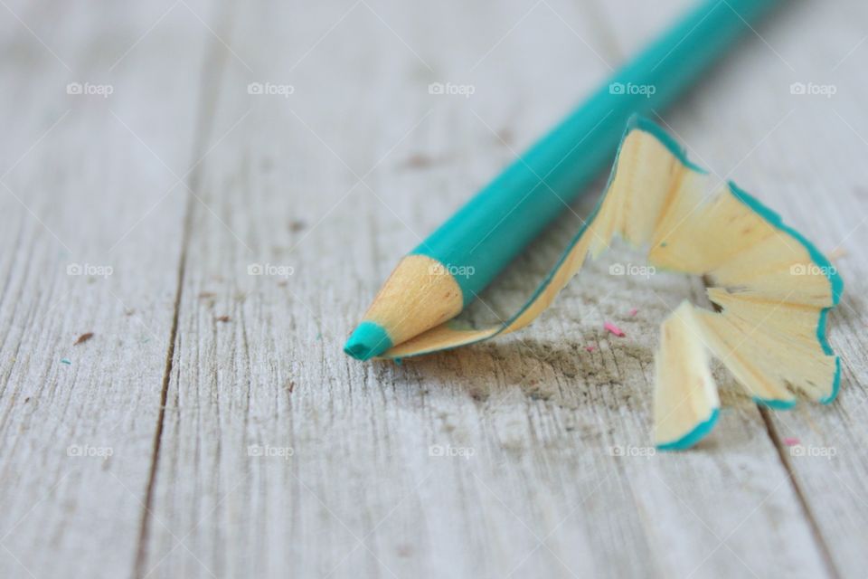 Sharpening pencil on table