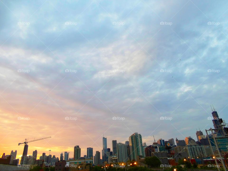 Good Morning Chicago. Taken from my rooftop in the West Loop during a sunrise in July.  Beautiful :)

