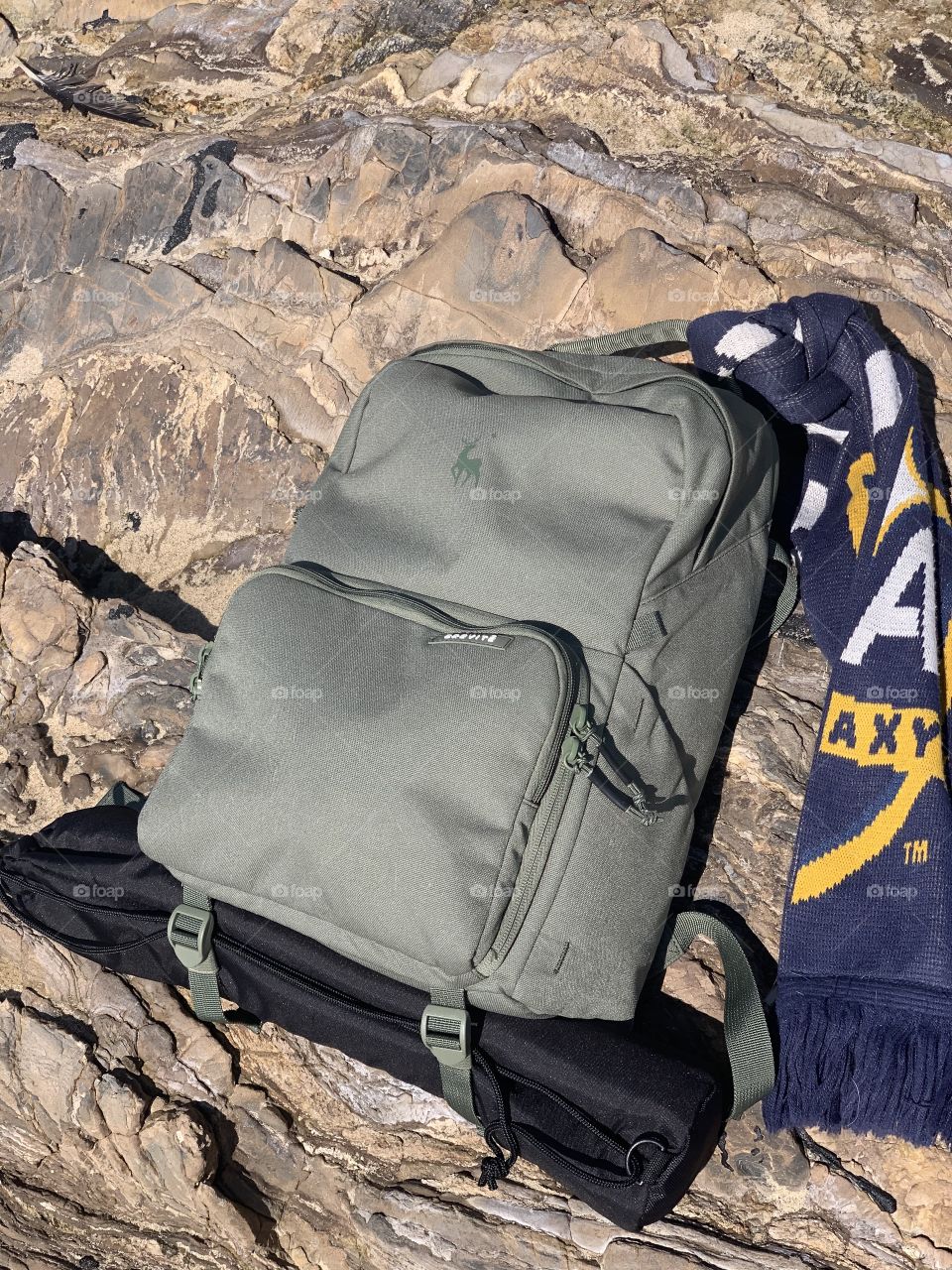 Camera bag at the rocks near the tide pools in Corna Del Mar