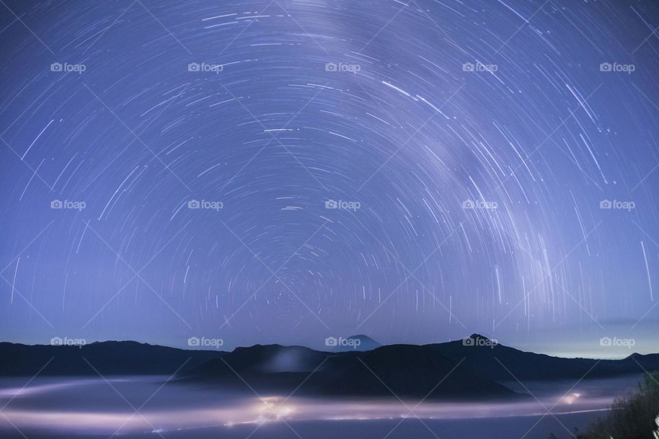 star trails on Mount Bromo, at night the view of this mountain presents thousands of stars in the sky