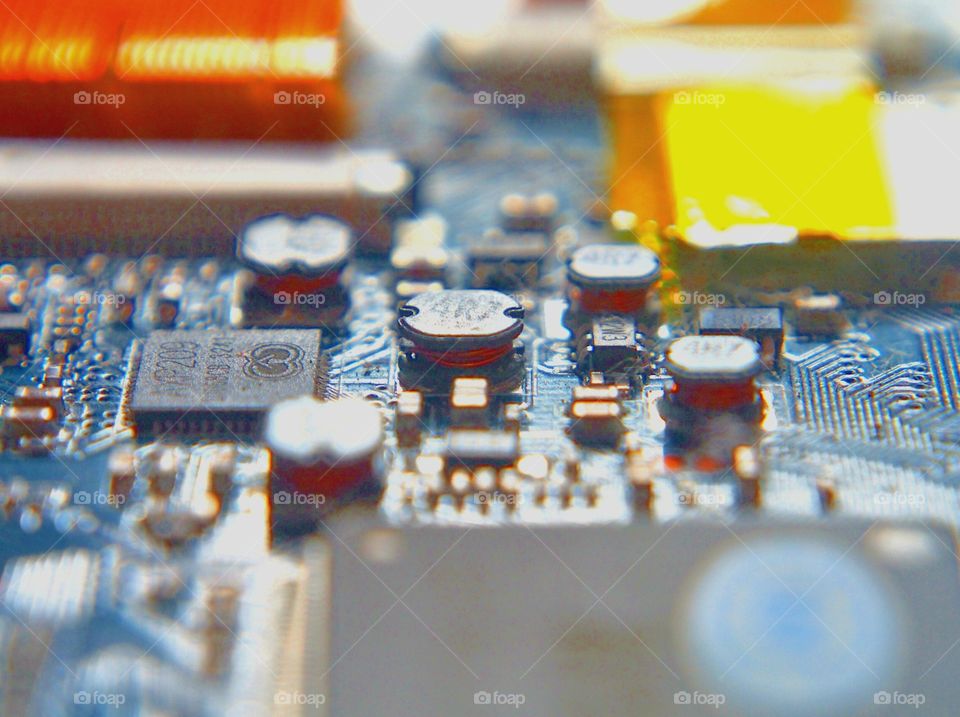 Close up of electronic on  blue electronic board