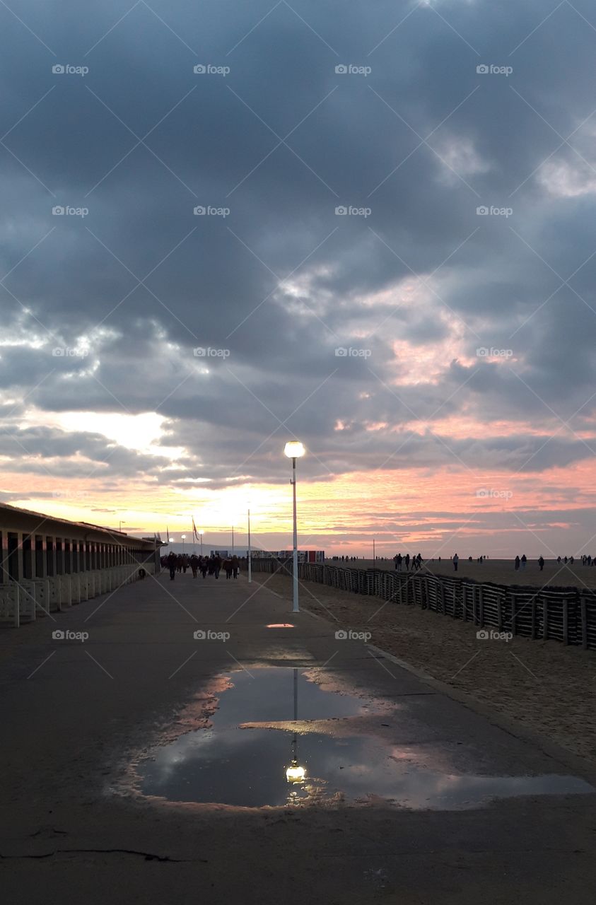 reflection on the sidewalk of Deauville