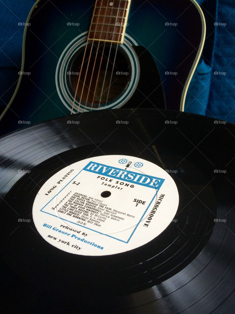 Record with blue guitar