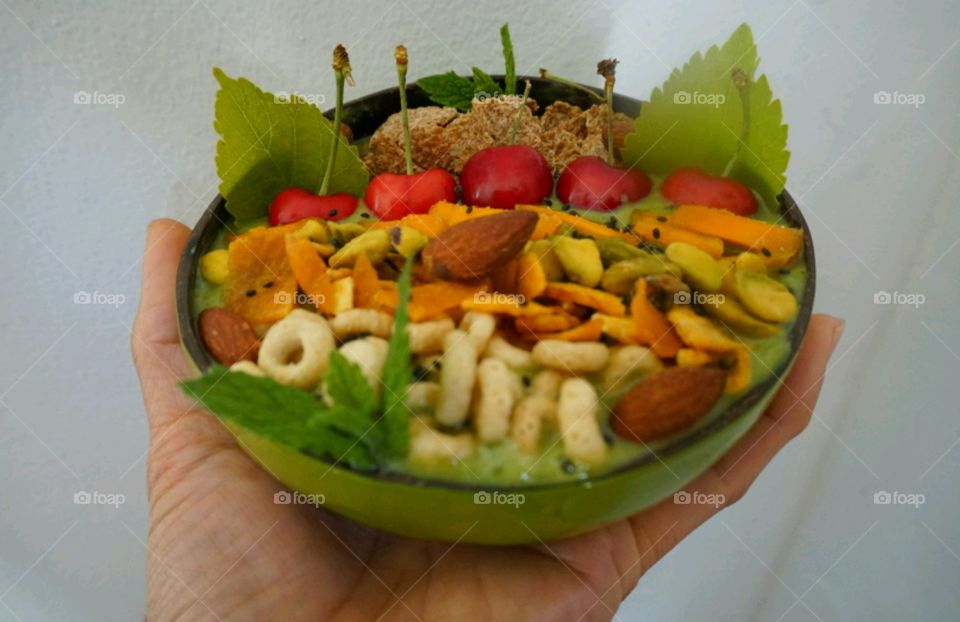 Fresh Fruit Smoothie Bowl - cheery,  mango, banana, cereals,  seeds and nuts