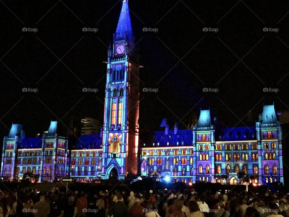 Ottawa Canada’s Parliament building all lit up as part of the annual Light and Sound show.