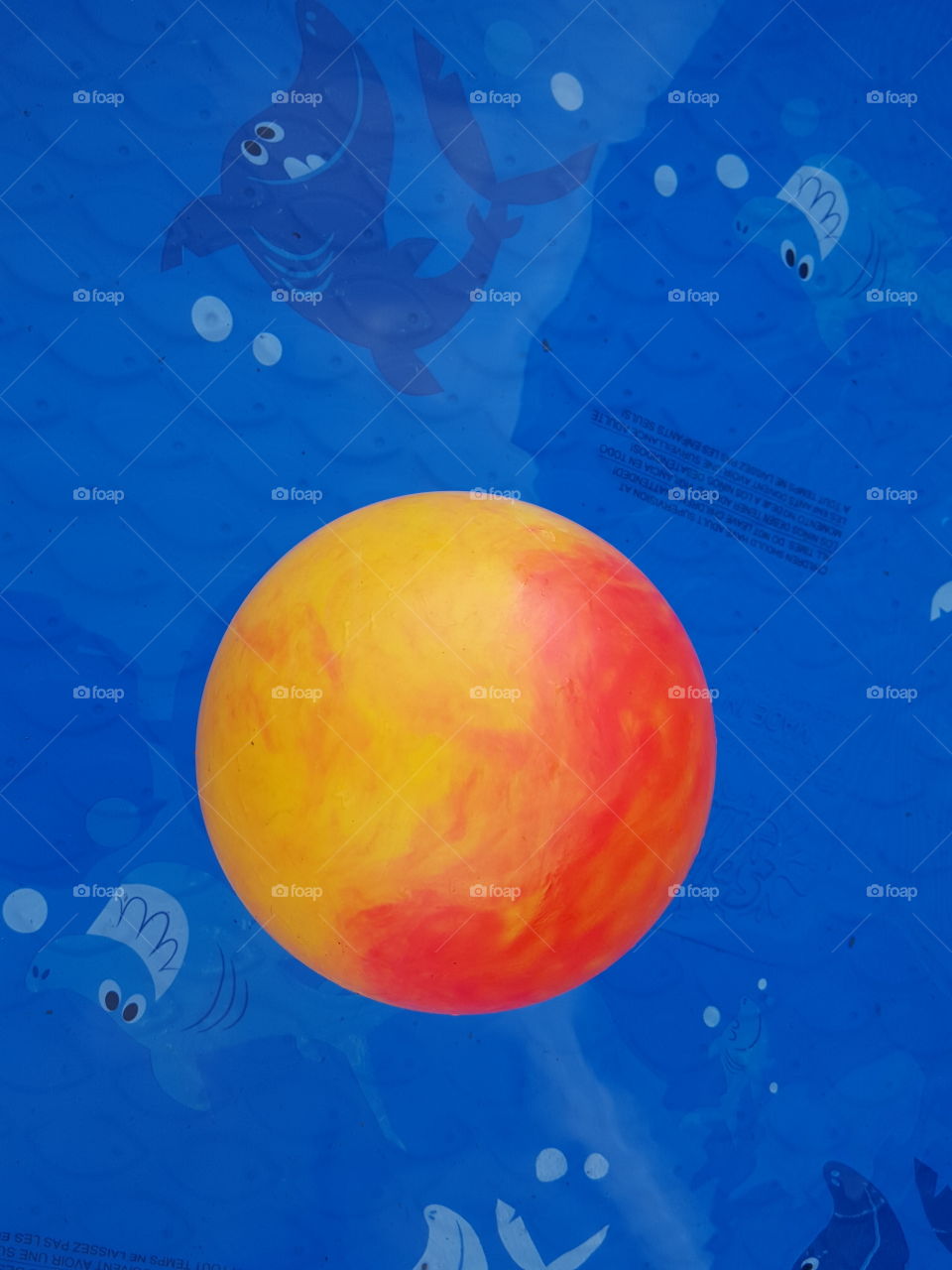 Orange Ball in Pool