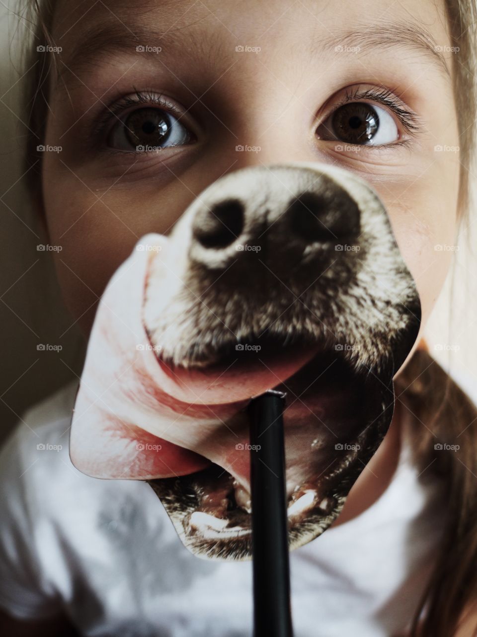 Dog snout mask on human face