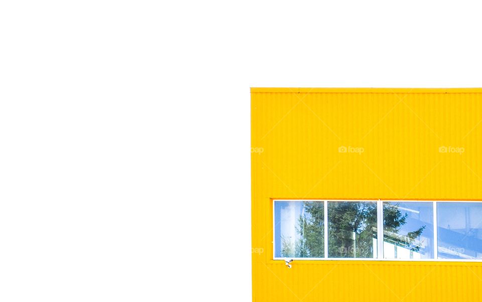 Corner of yellow metal house