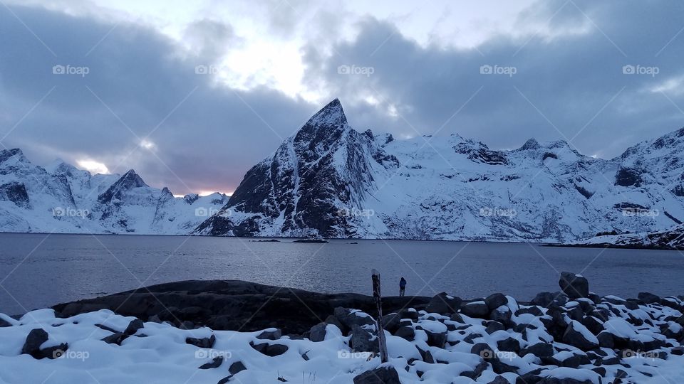 Sunset at snowy Fjords