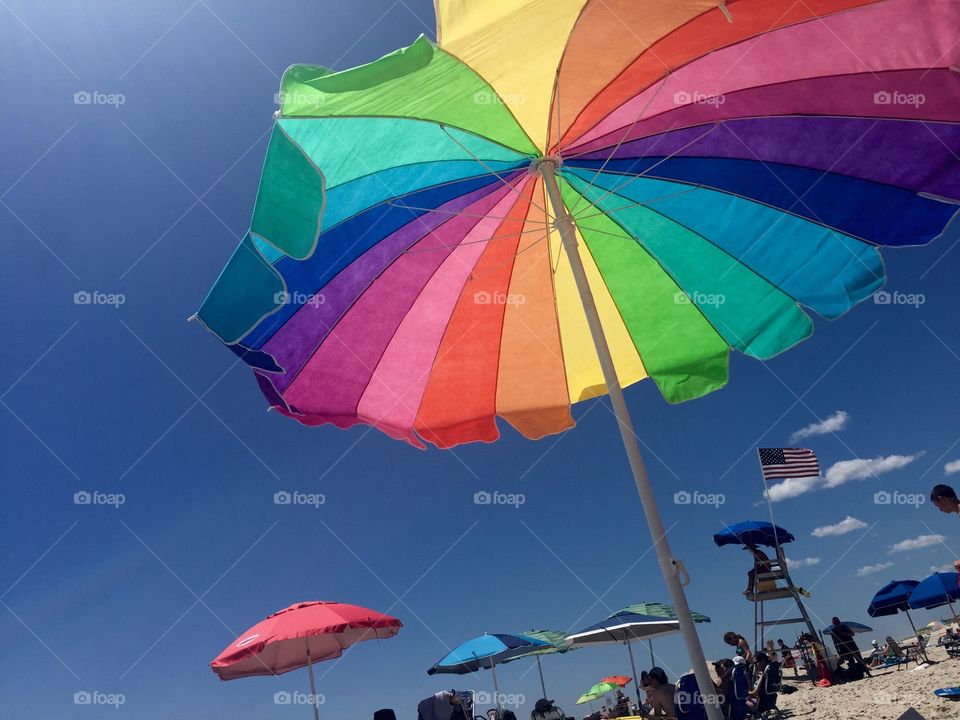 Rainbow umbrellas. Beach day 