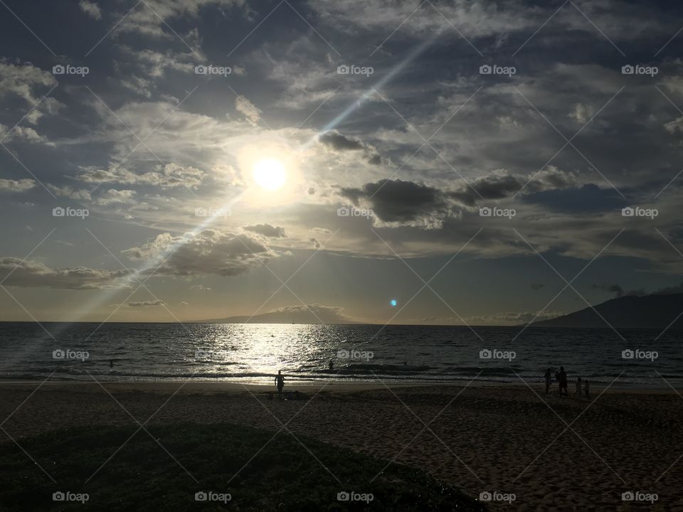 Silhouette of people at beach