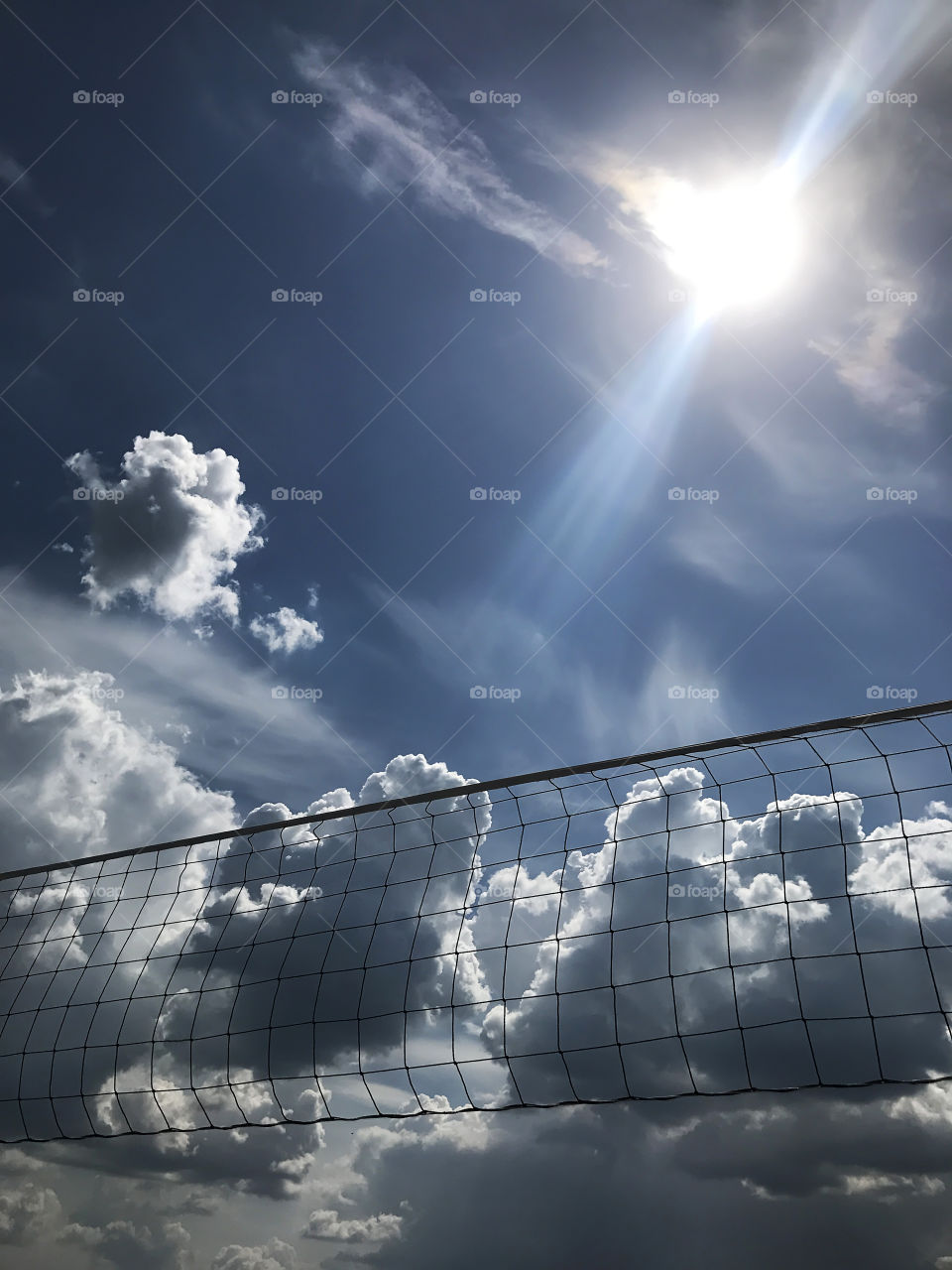 Enjoying the last summer days playing beach volleyball 