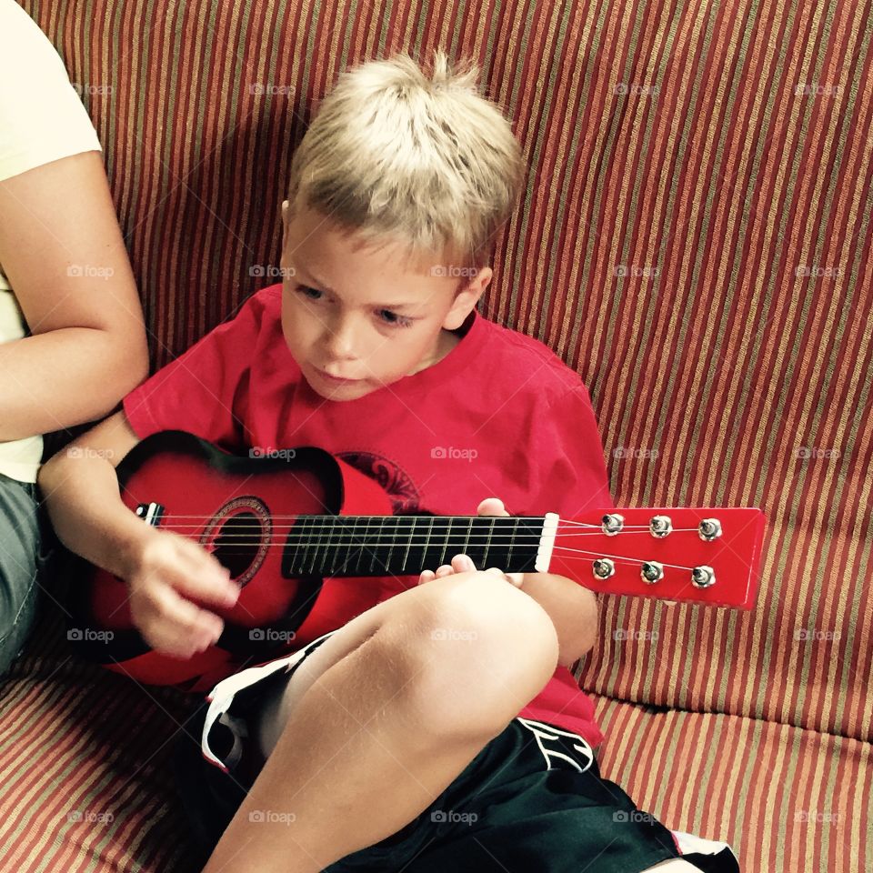 A Boy And His Guitar
