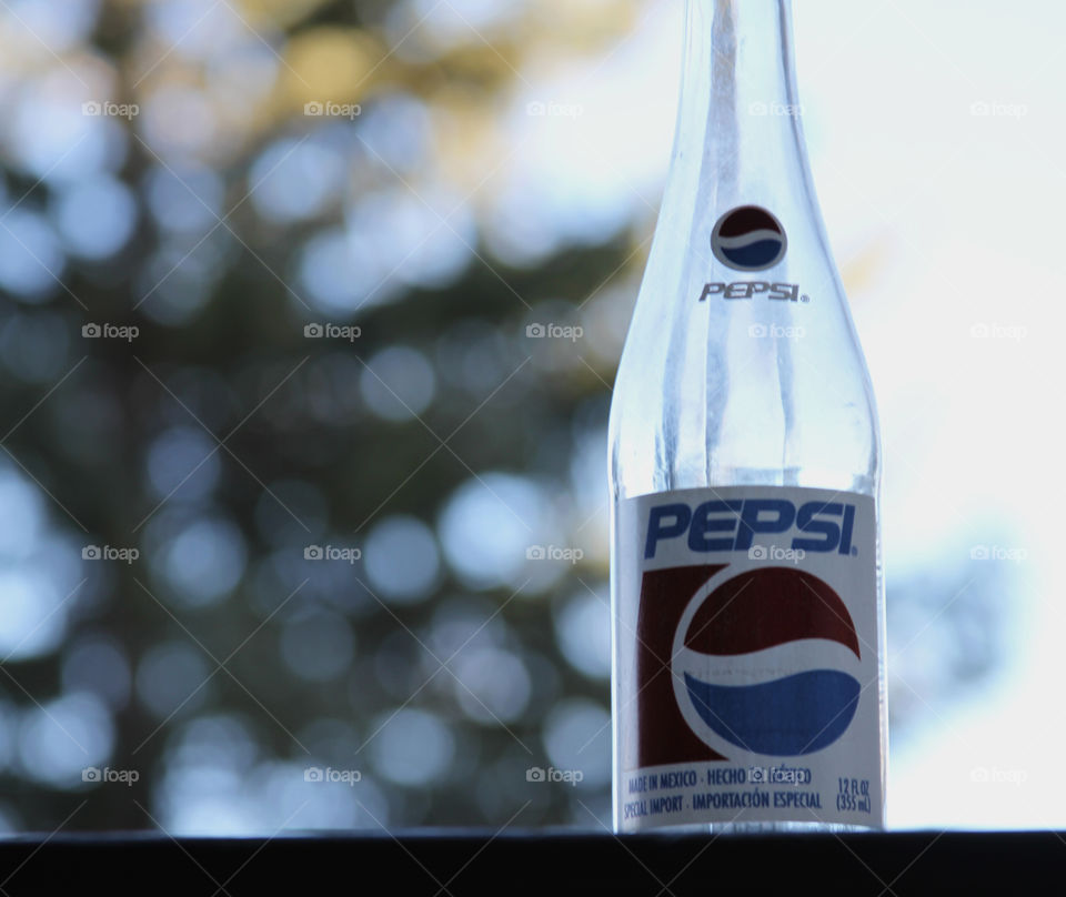 Pepsi bottle and tree