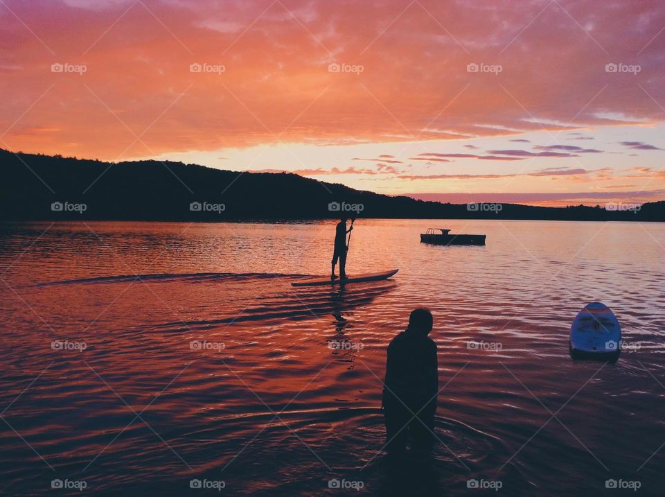 cottage and water sports in Ontario at beautiful sunset