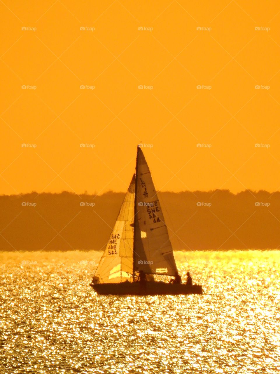 Sailboat in sunset