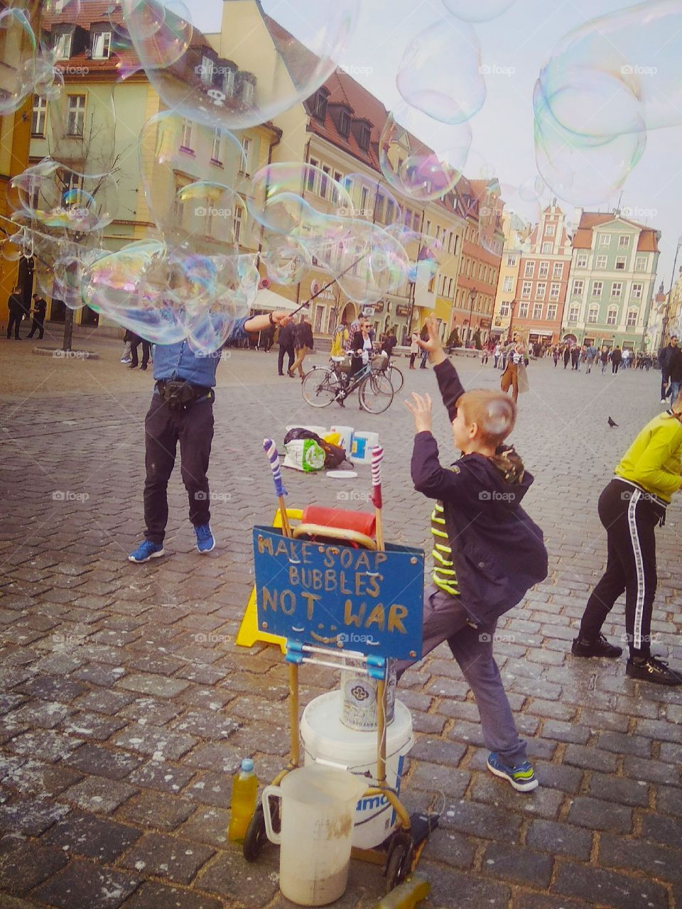 I don't know if he'll catch the bubble, but he has already caught happiness, for sure! 

Wrocław, Poland