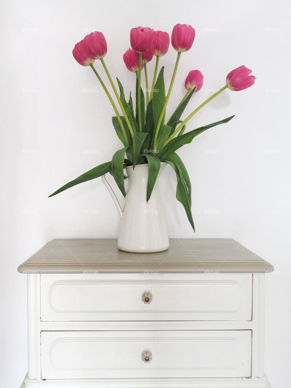 Pink tulips and table
