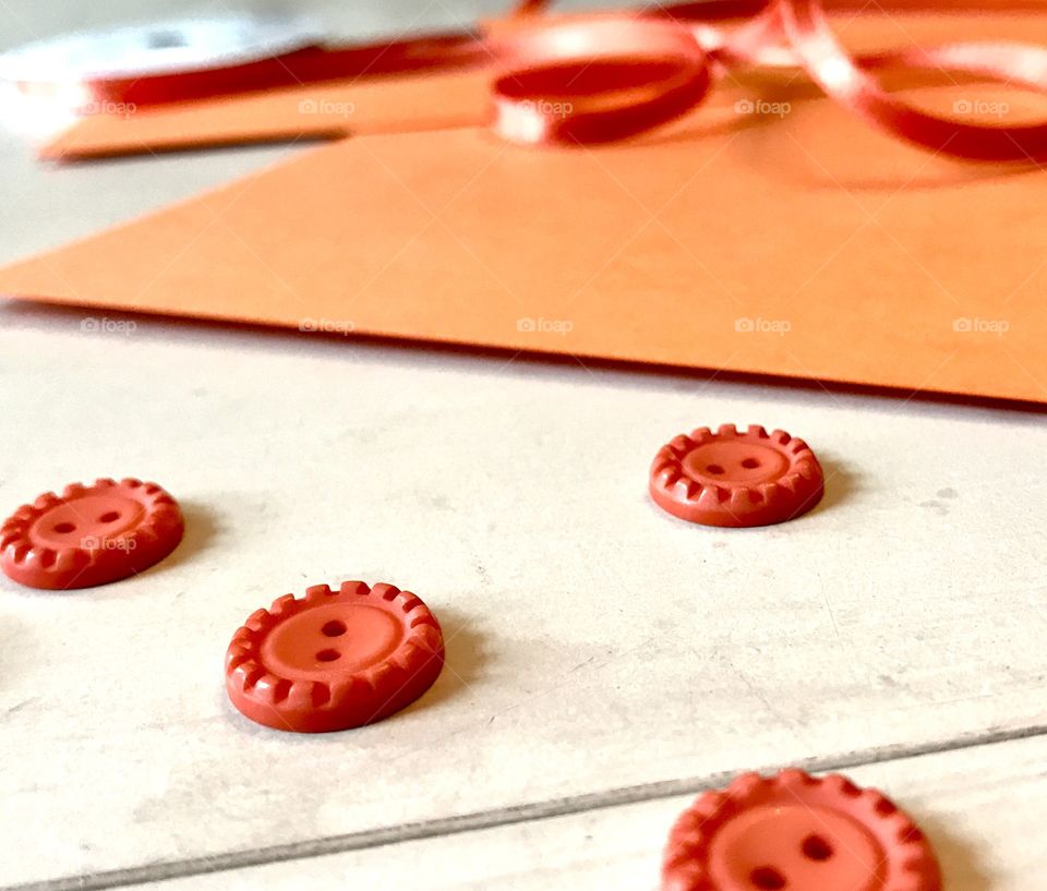 Orange buttons & paper