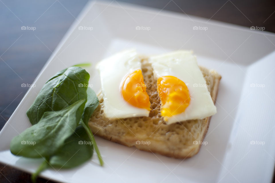 Egg in two slices on bread