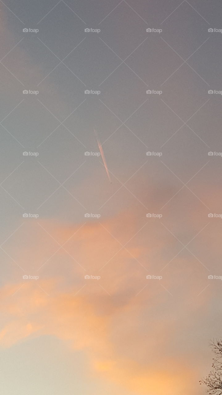 pink jet stream in the sunset