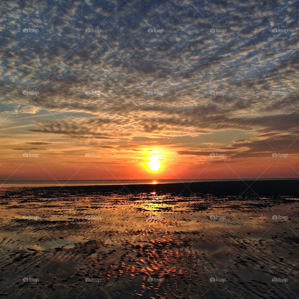 beach sunset clouds sea by claudeschneider