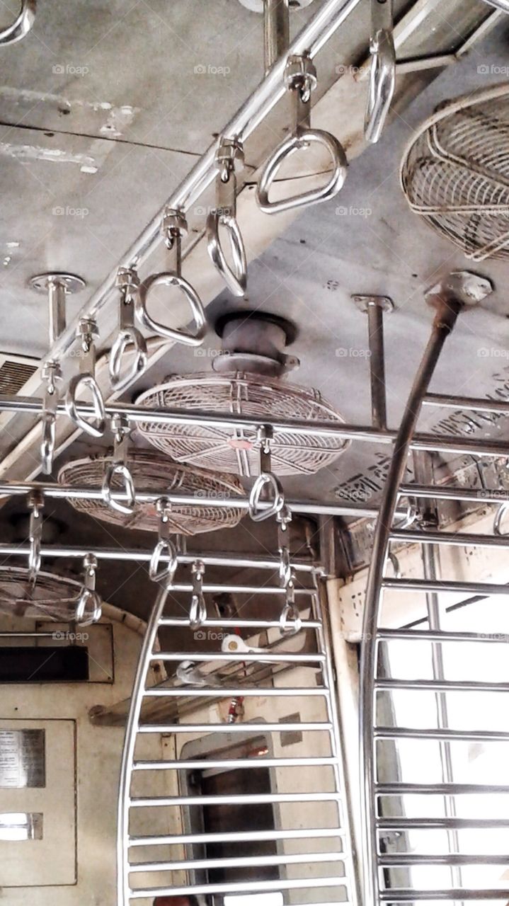 A first class coach of a local train in Mumbai, India.