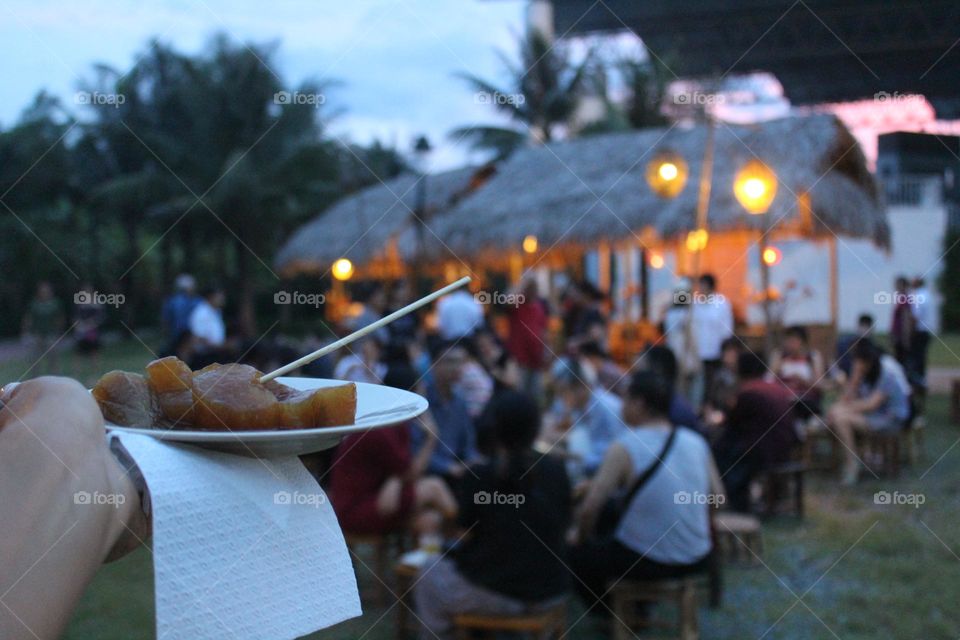 Local vegetarian snacks and insightful chats during a pre-show time of cultural and historical Tonkin village in Vietnam. 