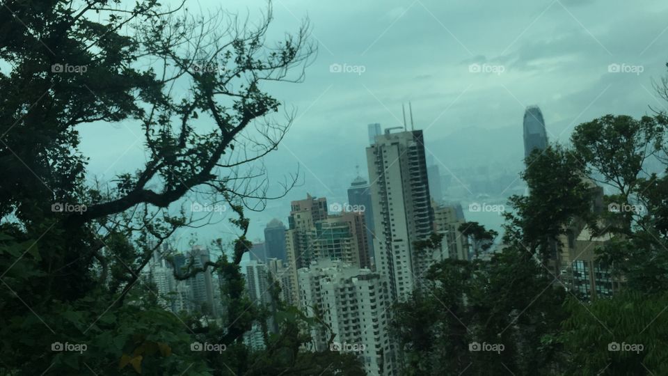 Hong Kong, China. A Blustery and. Stormy Day on The Way Down On The Tram from Victoria Peak.  Copyright Chelsea Merkley Photography. 2019. 