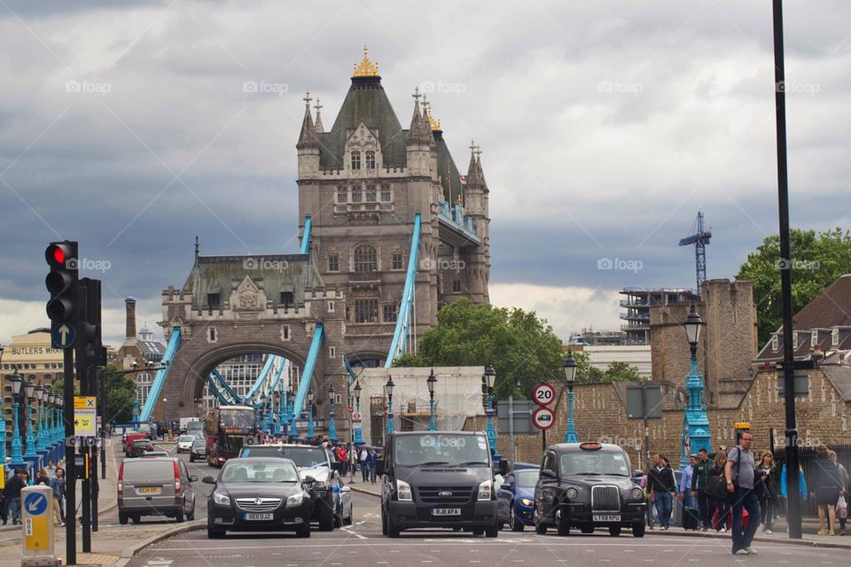 Tower Bridge on the river Thames in London, England- a view from a busy traffic road