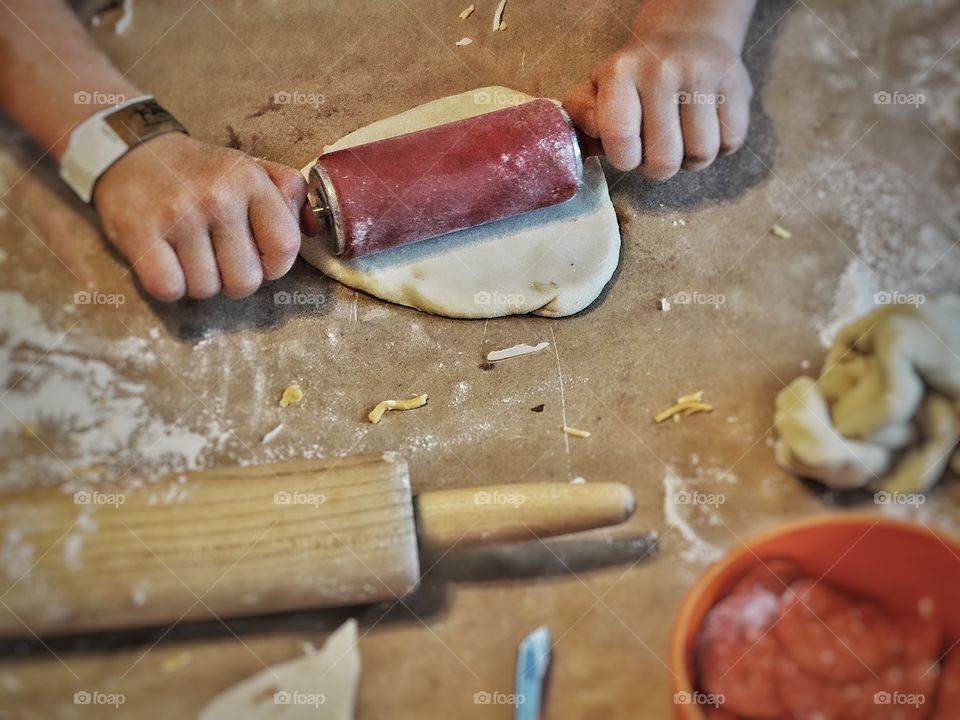 Baking At Home. Rolling Pins And Flour And Hands Making Dough
