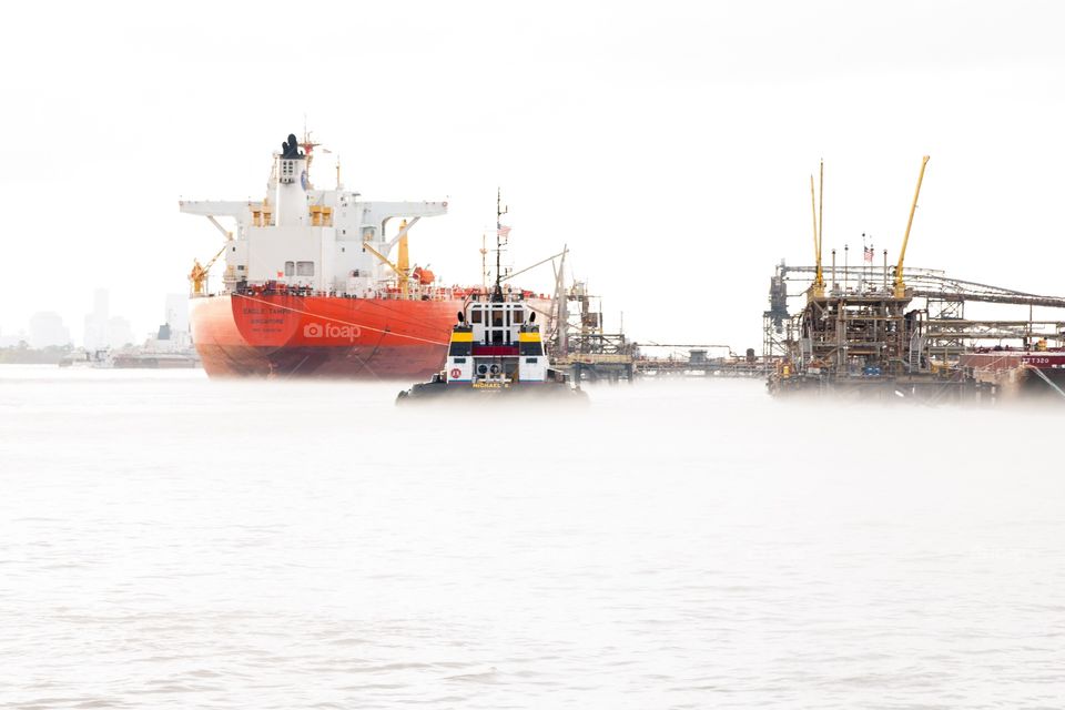 Ships in river fog