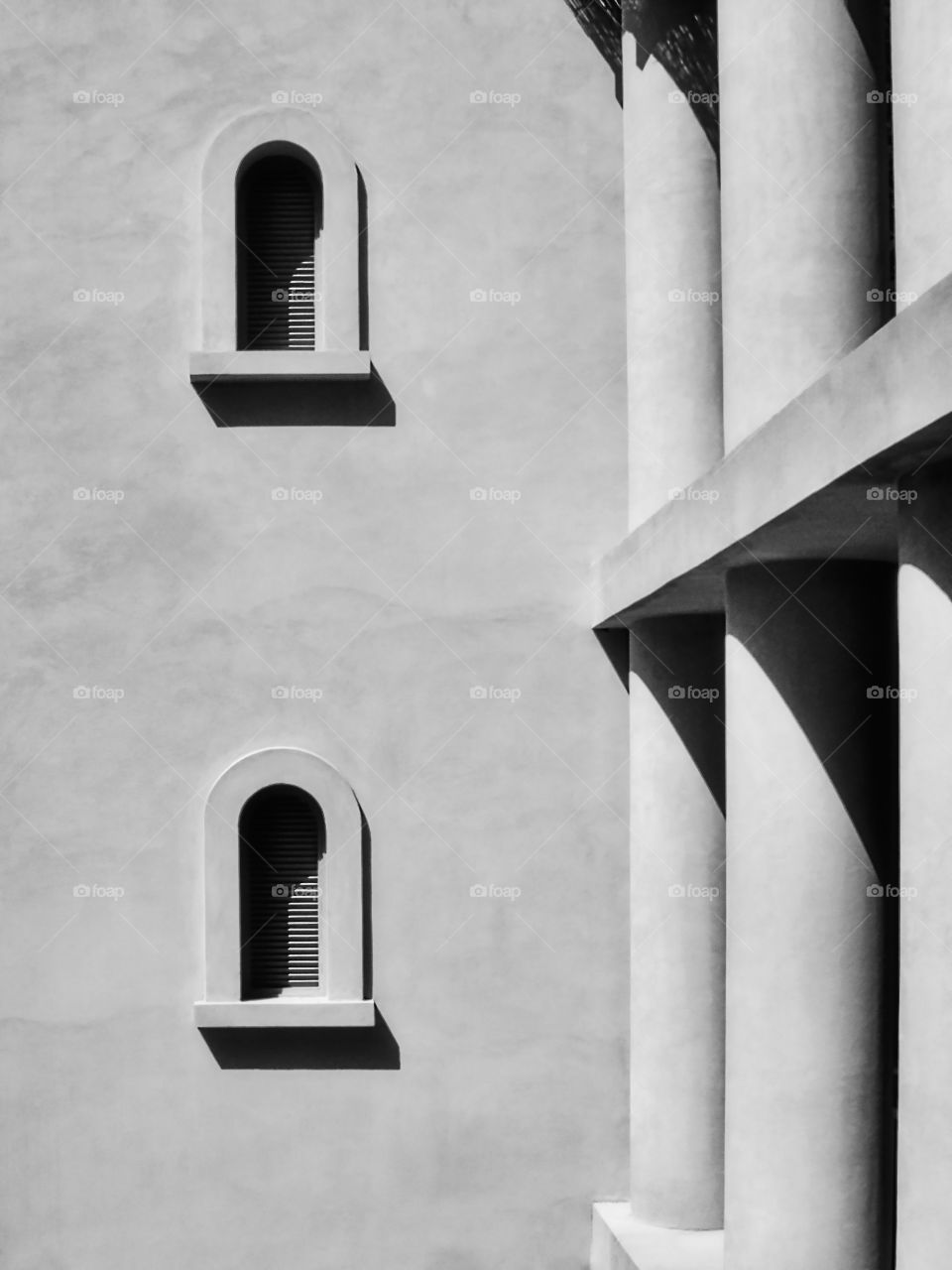 Facade with arch windows.